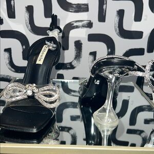 Dazzling Black and Silver Heels with Bow Accent